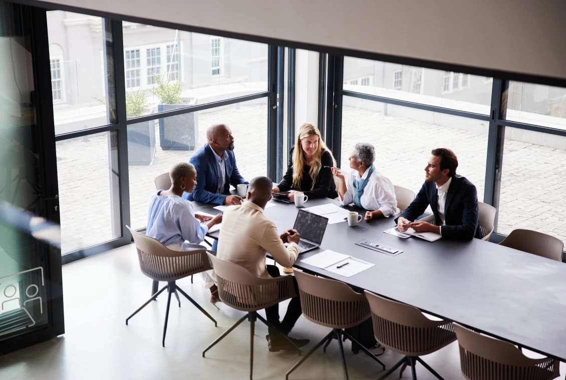 Diverse team discussing around a table