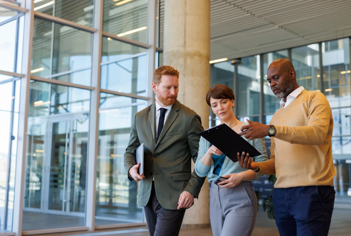 Business professionals discussing in modern office